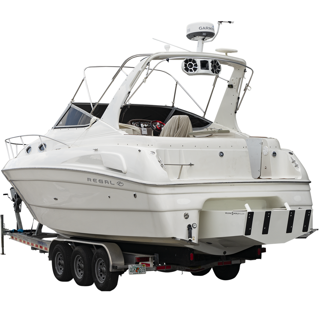 Alt text: A white Regal Commodore 28 boat mounted on a trailer, featuring a custom high flotation twin outboard engine bracket at the stern. The boat has tinted windows, a radar arch, and various electronic equipment on top. The background is transparent with a checkered pattern
