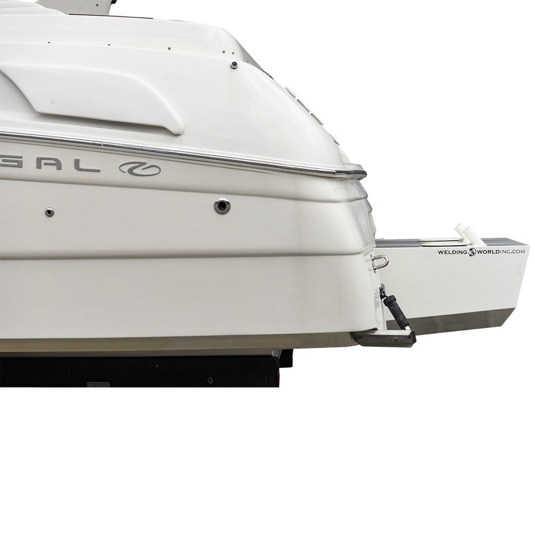 Close-up of the stern of a white boat showing the Whitewater/Seavee/Rampone 25 Twin Engine High Flotation Bracket, with part of the hull, a support arm, and the "Welding World Inc." logo visible on the bracket. The background is transparent with a checkered pattern