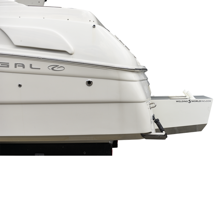 Close-up of the stern of a white boat showing the Whitewater/Seavee/Rampone 25 Twin Engine High Flotation Bracket, with part of the hull, a support arm, and the "Welding World Inc." logo visible on the bracket. The background is transparent with a checkered pattern