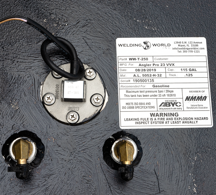 Close-up of the Angler 230 VBX OEM replacement belly fuel tank, featuring a fuel gauge and two fuel fittings, with a warning label indicating that leaking fuel is a fire and explosion hazard. The tank is labeled with manufacturing details, including the model number and specifications