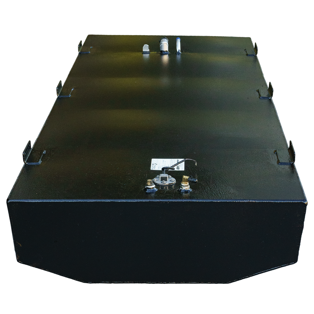 A long, black, rectangular fuel tank with a rounded corner, mounting brackets, and various fittings on its textured top surface, against a checkered background