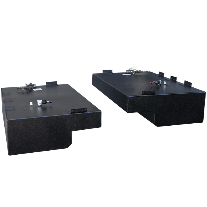 A matching pair of black, textured boat fuel tanks, presented as a port and starboard saddle tank set against a checkered background. The two tanks are arranged diagonally and are mirror images, each with a large rectangular body and a prominent step-down notch on its lower inboard side. Both tanks feature multiple mounting tabs along their top edges. The tank in the foreground is viewed from its front corner, while the tank in the background is viewed from its rear corner