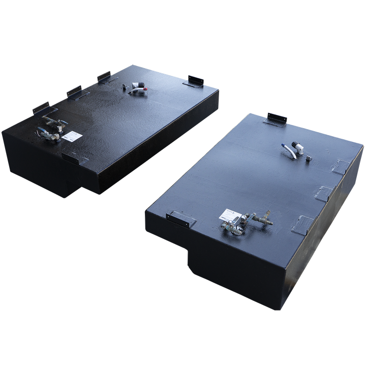A pair of black, coated saddle fuel tanks, presented as a matching port and starboard set against a checkered background. The tanks are positioned diagonally, each featuring a rectangular body and a step-down notch on its lower inboard side. The tank in the foreground is shown from a high, front-three-quarter angle, revealing a prominent cluster of fuel valves, a sending unit, and a white label. The second tank, in the background, is viewed from the rear, showing its respective set of fittings