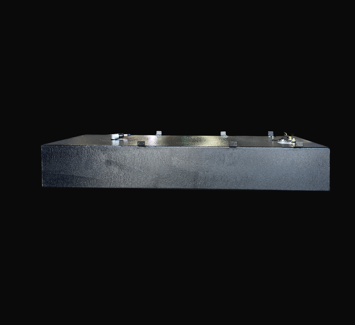 A straight-on side elevation studio view of a physical, finished black encapsulated Sport Craft 25 WA 1994 OEM replacement marine fuel tank from file image_99fd84.jpg, isolated against a black background. This side-profile perspective emphasizes the tank's long rectangular profile and the thick, protective, textured black TarGard epoxy coating applied over the heavy-gauge marine-grade 5052-H32 aluminum tank shell to provide maximum resistance against saltwater pitting and bilge cavity moisture. Along the to