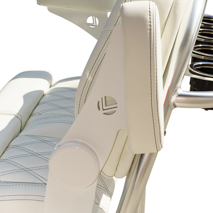 Close-up view of a white leather seat with diamond stitching, featuring a sleek armrest design and a circular support structure, set against a transparent background