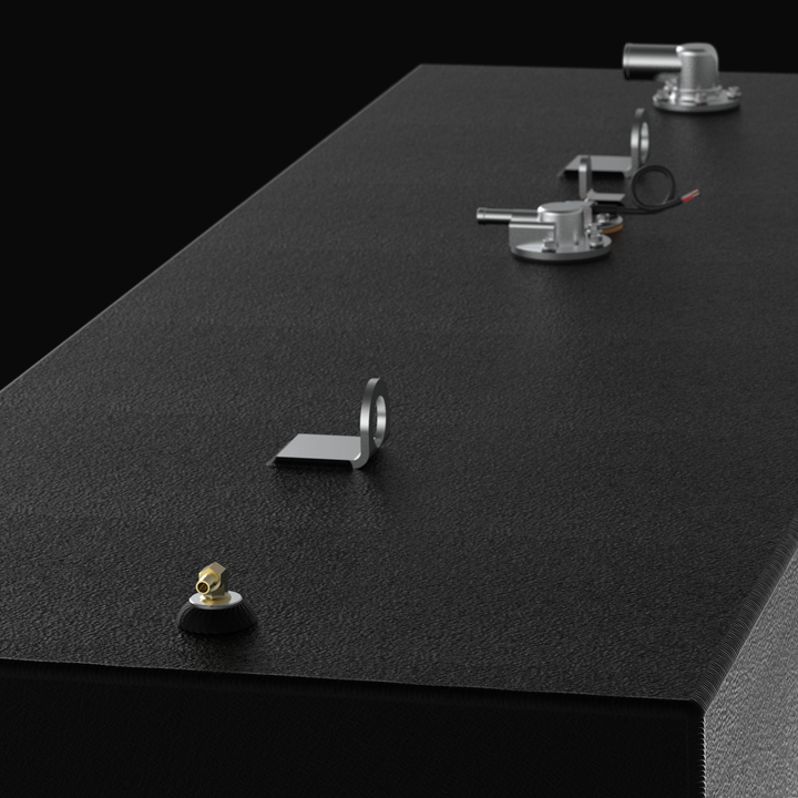 Detailed close-up 3D rendering of a matte black marine fuel tank with a textured coal-tar epoxy finish, showcasing top-mounted brass fittings, stainless steel lifting eyes, and a KUS fuel sending unit from a low-profile perspective on a black background.