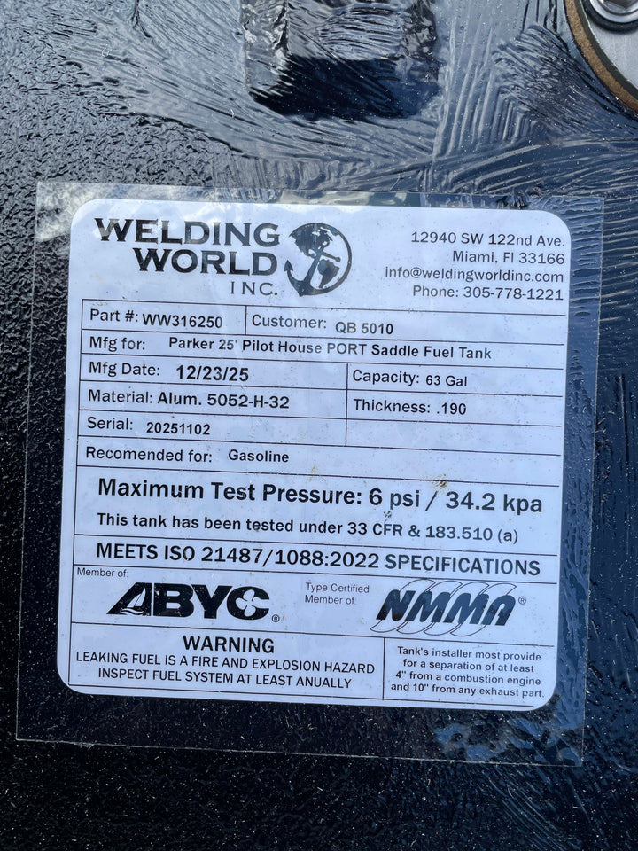 Welding World Inc. label on a metal component with specifications and certifications.