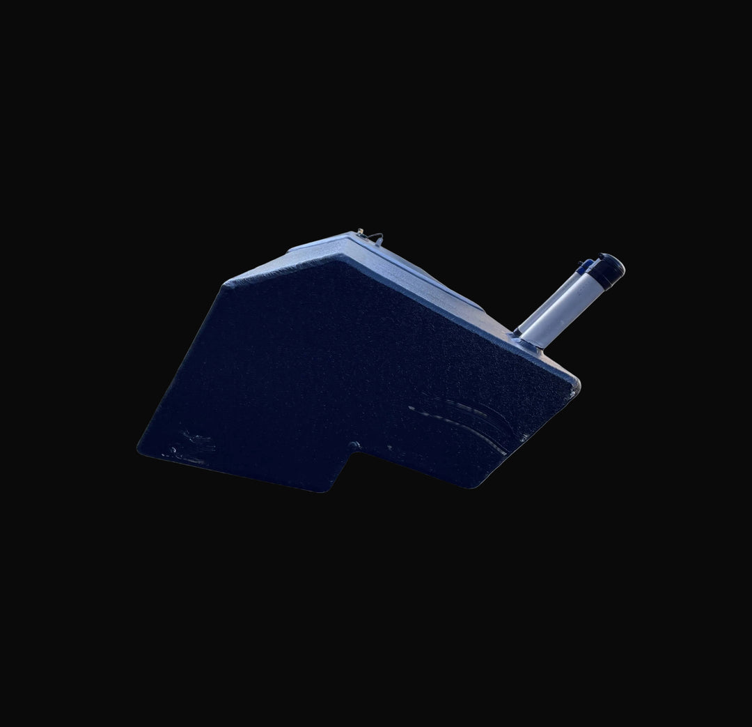 Profile view of the Seacraft 32 replacement fuel tank, highlighting the extended aluminum fill and vent pipes. The image details the complex, custom-fabricated shape with an angled bottom and notched corner, finished with a black protective coating.