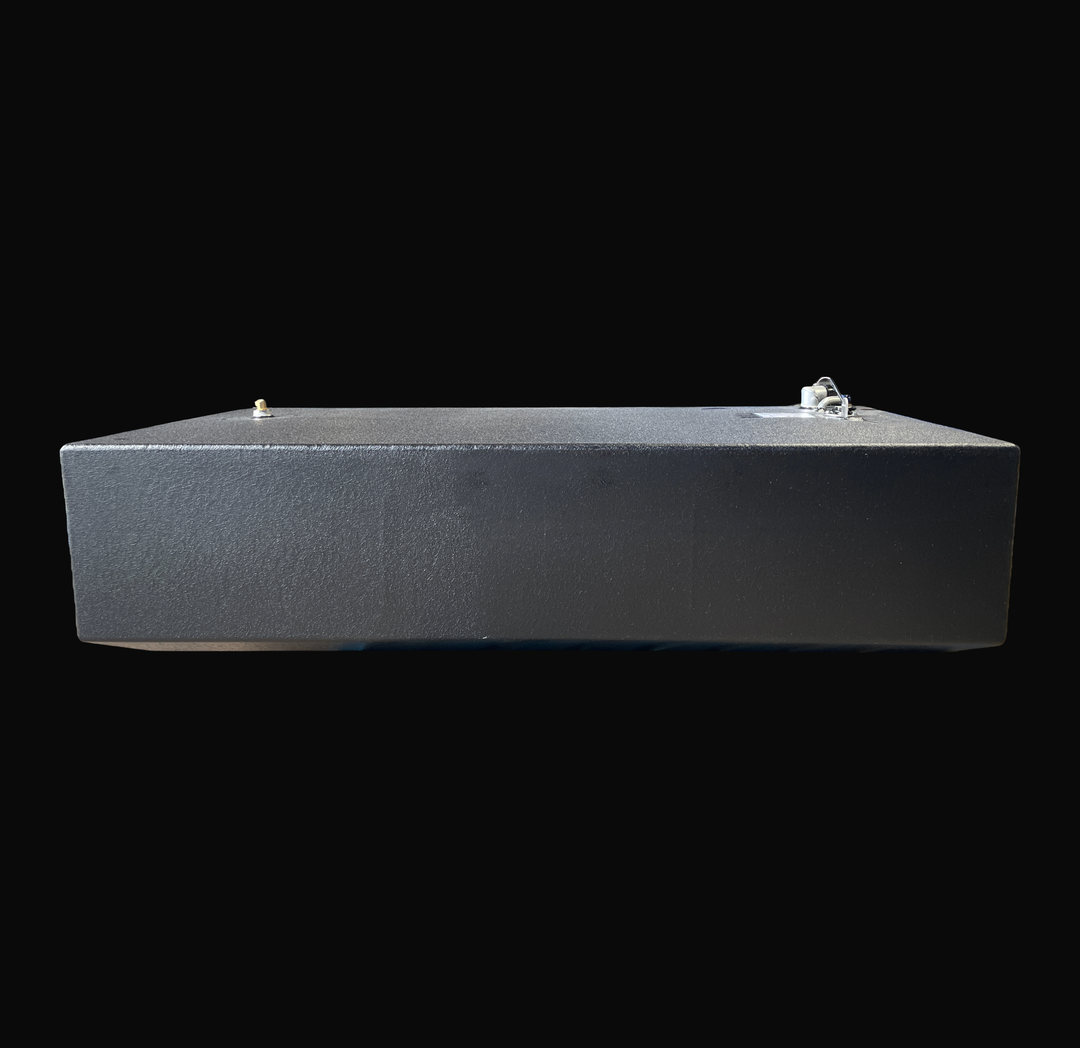 An eye-level studio side profile view displaying the full length of a physical, finished black encapsulated Edgewater 24 OEM replacement marine fuel tank (110 gal) from file image_9c6cfc.jpg, isolated against a black background. Precision-fabricated from heavy-gauge marine-grade 5052-H32 aluminum, the low-profile V-bottom body is fully encapsulated in a protective, textured black TarGard epoxy coating to resist severe saltwater pitting and bilge moisture decay. Top deck hardware features a left-mounted high