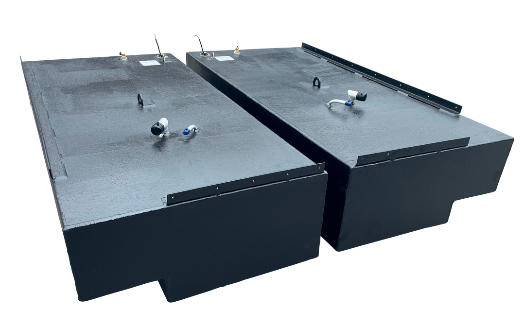 Pair of large, rectangular, black marine fuel tanks (port and starboard) designed for a Stama 2001, each with a 151-gallon capacity. Fittings and inspection ports are visible on the top surface.