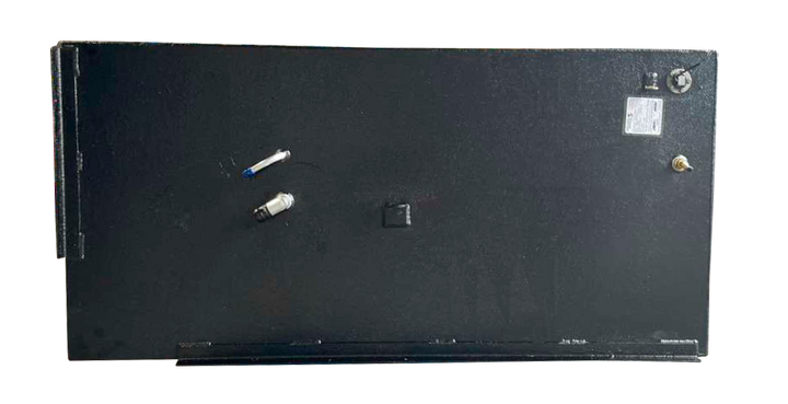 Top view of a black, rectangular marine fuel tank showing various top-mounted fittings including a fuel sender and a vent connection.