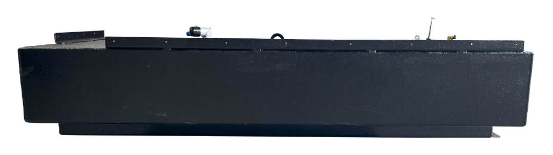Side view of a black marine fuel tank with a textured coating, showing the lower rectangular cutout for hull clearance, and various fittings on the top surface.