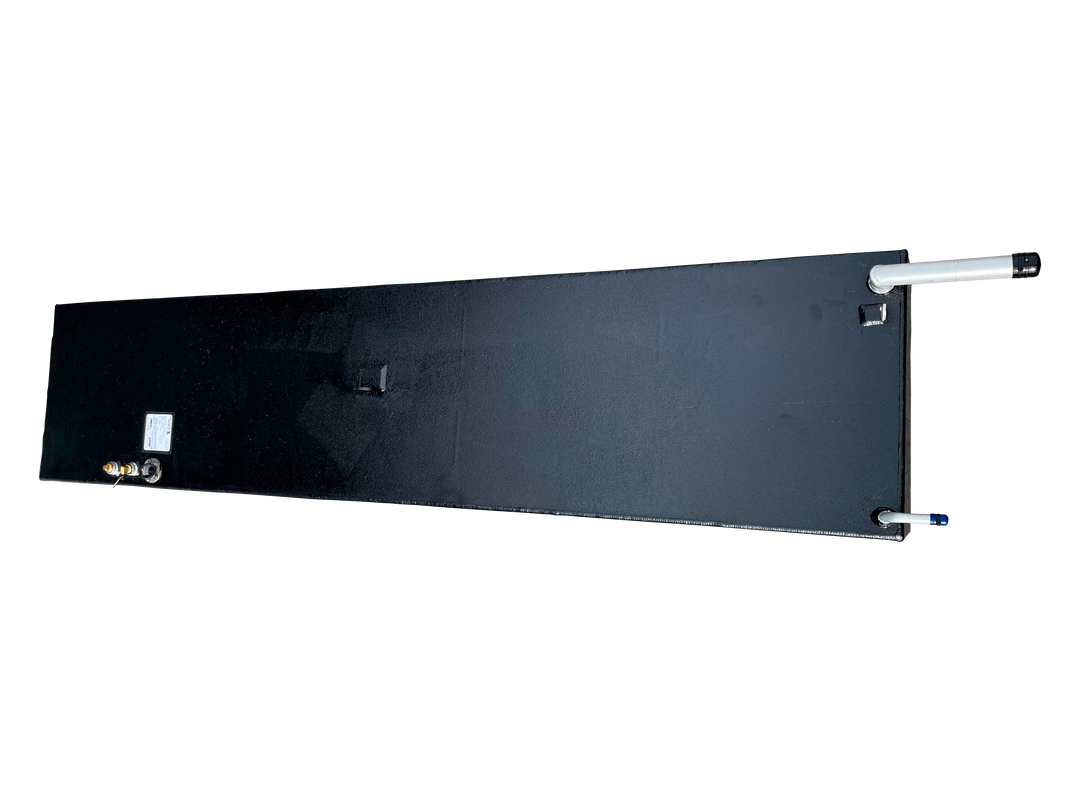 An overhead photograph of the long Port marine fuel tank with its textured black finish. The view captures the silver fill neck and blue-capped vent at the bottom end, while the opposite end features two brass fittings, an electrical lead, and a technical specification sticker.