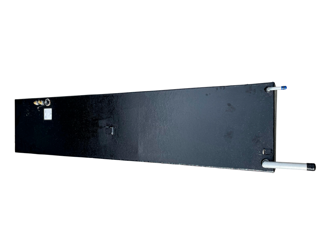 An overhead photograph of a single long rectangular marine fuel tank with a textured black finish. The image provides a clear view of the top surface, showing the silver fill neck at the bottom left, a central silver lifting eye, and technical labels and brass fittings at the top right.