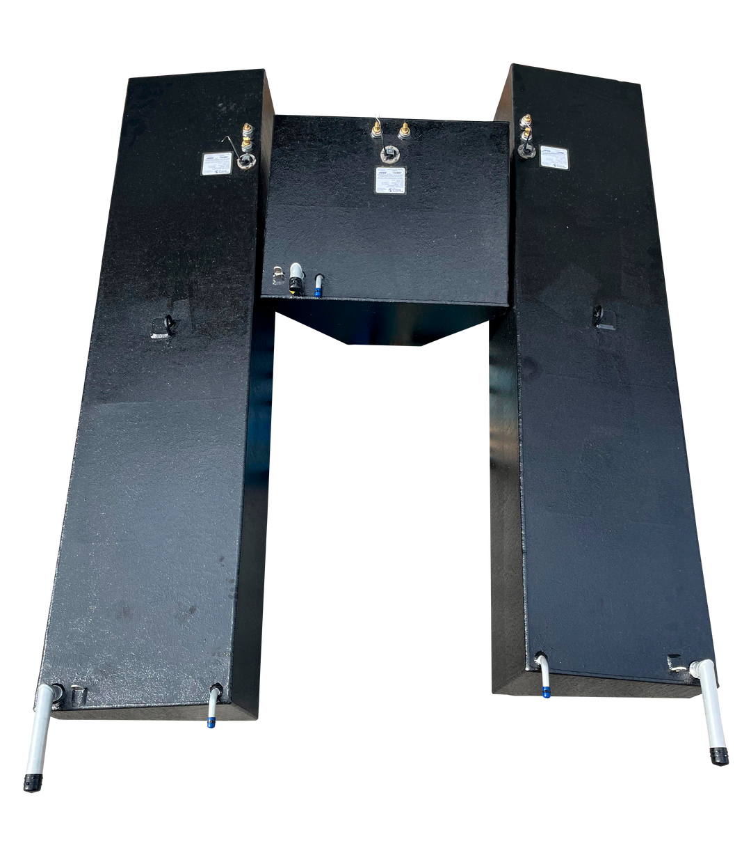 A top-down photograph showcasing the relative layout of three black marine fuel tanks for a Conch 27 boat. Two long side tanks are positioned parallel to each other, flanking the smaller, wedge-shaped center tank located between their rear sections, highlighting the uniform placement of hardware across the entire set.