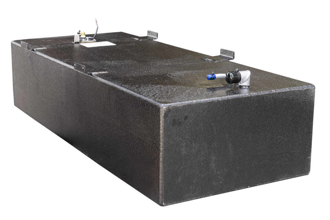 Photo showing a black Built to OEM Specs fuel tank with a textured matte finish from a front angle. The tank features four mounting brackets along the top edge and a variety of fittings on the top surface including a white plastic pipe with a blue fitting and a black protective cover. The background is transparent