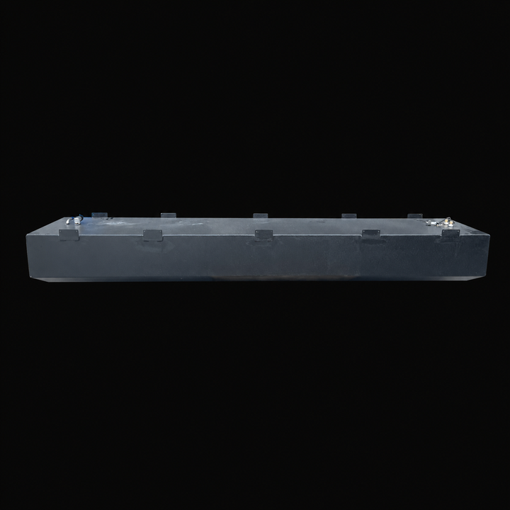 A full side-elevation perspective view of an elongated black Baja 28 1990 replacement marine fuel tank isolated against a black background. This high-capacity 212-gallon center-hull fuel cell showcases an extended low-profile structure featuring precision-welded perimeter mounting tabs distributed evenly along its top edges to secure the tank into the vessel's framing. Precision-fabricated from heavy-gauge marine-grade 5052-H32 aluminum, the entire unit is treated with a textured, anti-corrosive black TarGa