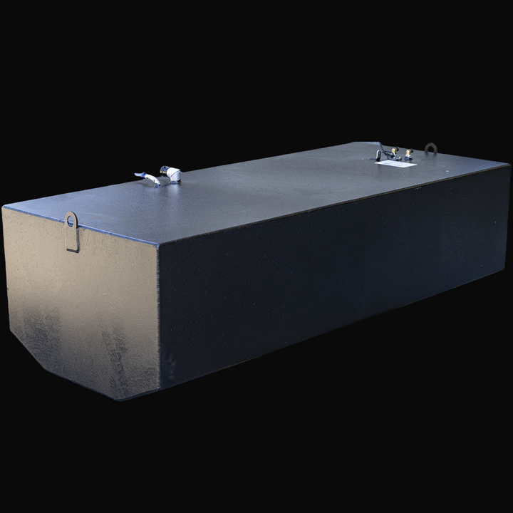 A large black rectangular marine fuel tank with a matte textured finish is shown from a front-left angled perspective. The tank has rounded corners on the front bottom edges and a flat top surface featuring several welded mounting brackets along the sides and back. There are two circular lifting eyes, one near the front left corner and another near the back right corner. The top has various fittings including a white plastic pipe with a blue tip, brass fittings, a sensor with wires