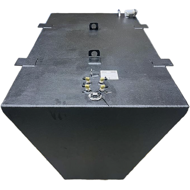 A dark grey, irregularly shaped metal tank with a textured surface is shown from an elevated perspective against a black and grey checkered background. The tank's trapezoidal side and rectangular top are visible, along with various fittings, including nozzles, caps, and what appear to be handles or mounting points, on its upper surface. A small white label is also present on the tank's top