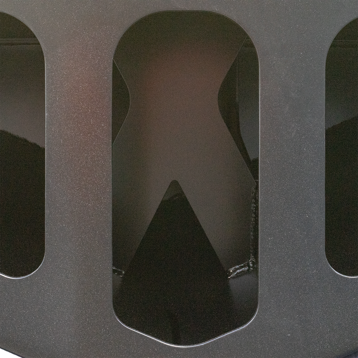 Close-up of the Black Ops High Flotation Twin Outboard Engine Bracket, showing a dark, matte-finished metal surface with a large central cutout and rounded edges. The surface has a slightly textured appearance with visible welds along the edges of the cutout