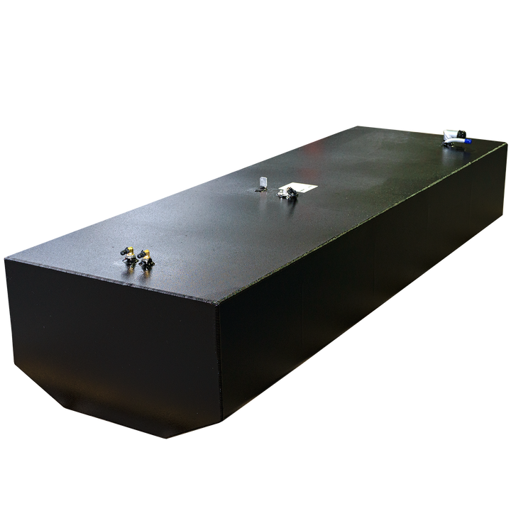 An eye-level shot of a rectangular black metal tank with a textured surface, featuring various small fittings on its top. A white sticker is visible near the center of the tank's top. The background is a repeating pattern of black and transparent squares