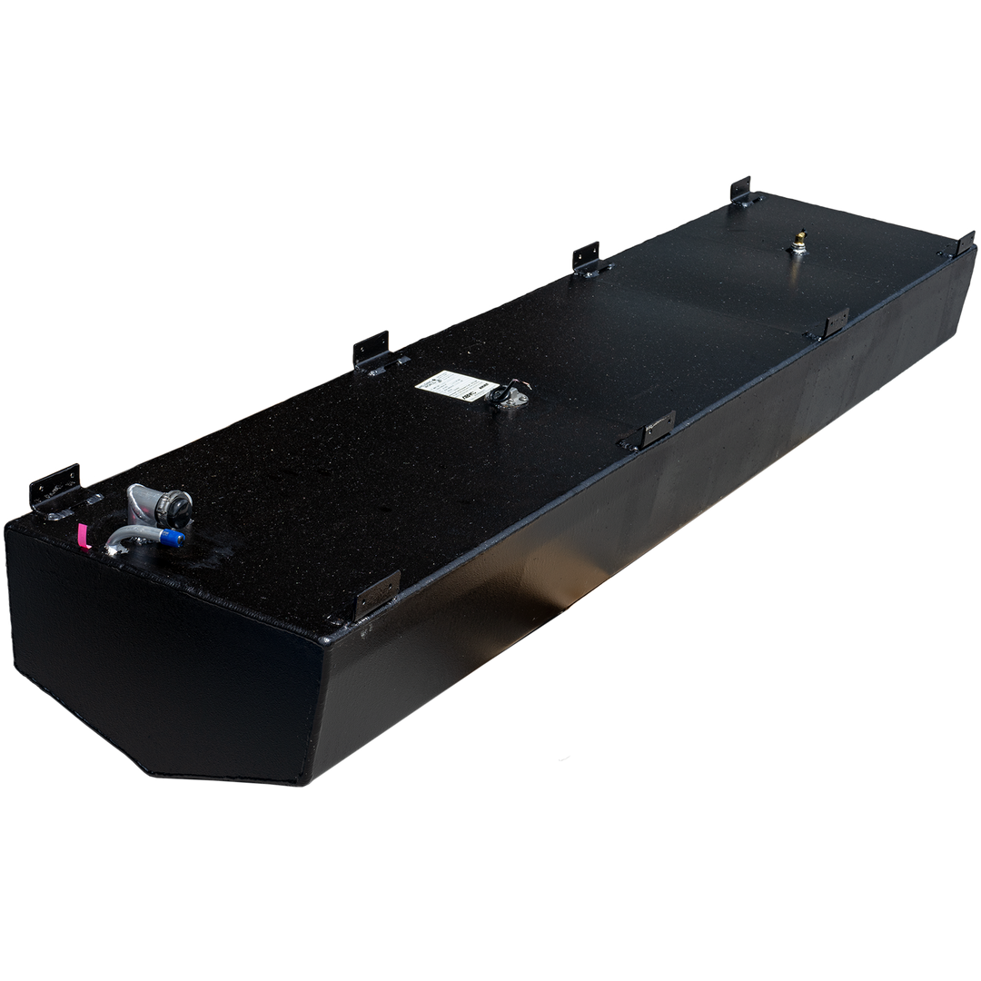 A long, black, rectangular fuel tank with a textured surface and multiple metal brackets along its top edges. Various fittings are visible on the top surface, including a fuel sender with wiring and a curved hose connection with a blue cap. The front end of the tank is tapered