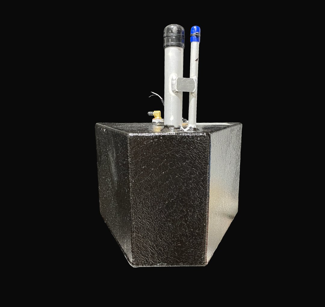 A studio front-facing end elevation view of a physical, finished black encapsulated Caribe DL-11 OEM replacement marine fuel tank (11 gal 2016) from file image_aebafa.jpg, isolated against a black background. Precision-fabricated from heavy-gauge marine-grade 5052-H32 aluminum, the deep wedge end-profile is fully encapsulated in a protective, textured black TarGard epoxy coating to prevent severe saltwater pitting and bilge moisture accumulation. Prominently centered on the top deck is an upright vertical f