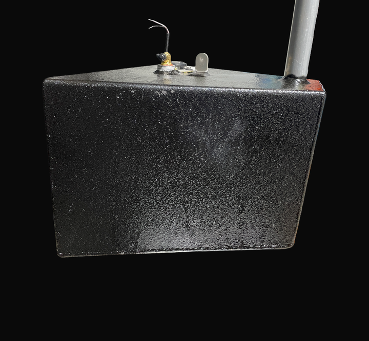 A studio straight-on side elevation view of a physical, finished black encapsulated Caribe DL-11 OEM replacement marine fuel tank (11 gal 2016) from file image_aecadb.jpg, isolated against a black background. Precision-fabricated from heavy-gauge marine-grade 5052-H32 aluminum, the deep rectangular body profile is fully encapsulated in a protective, textured black TarGard epoxy coating to resist severe saltwater pitting and bilge moisture. Visible top deck hardware includes an upright vertical fill neck ext