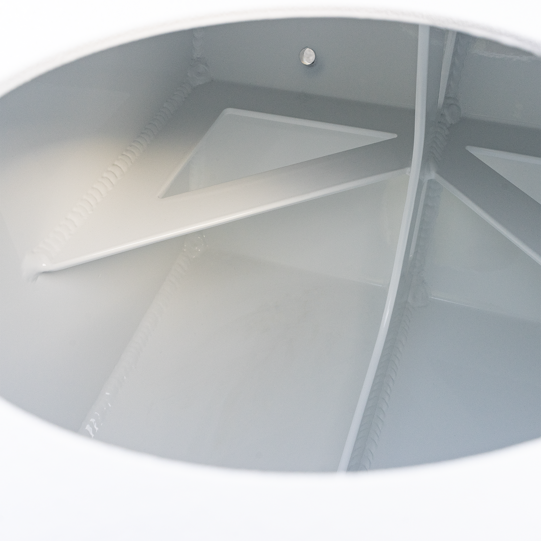 Close-up view of the interior of a 1989 Apex Contender 25' single engine bracket, showcasing the sleek, white surface and structural design