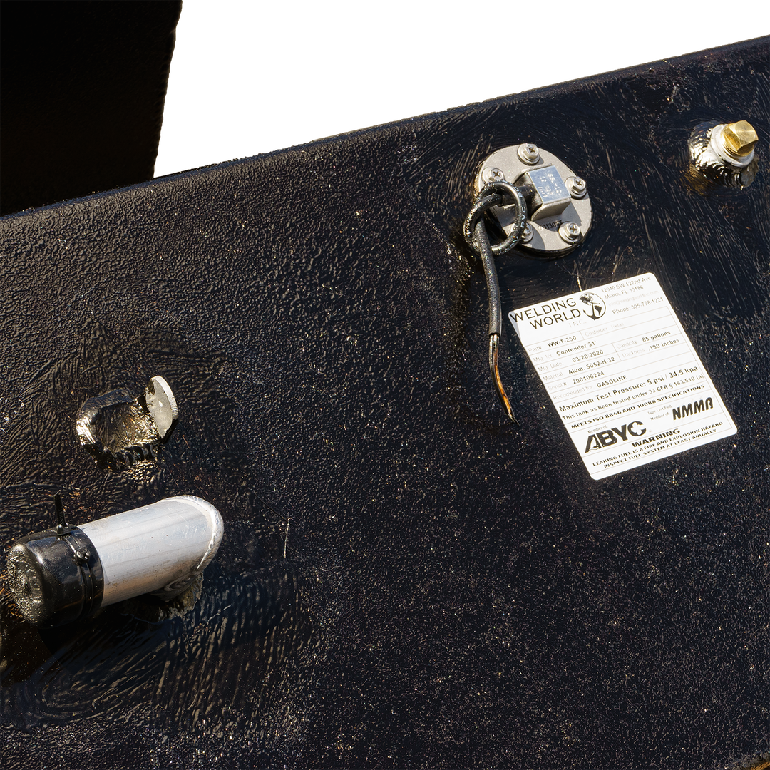 Close-up view of a Contender 31' OEM Replacement Fuel Tank Combo Kit, featuring a large belly tank with a capacity of 128 gallons, two standard saddle tanks each with a capacity of 85 gallons, and a water tank with a capacity of 21.26 gallons. The image shows the tank's fittings and labels