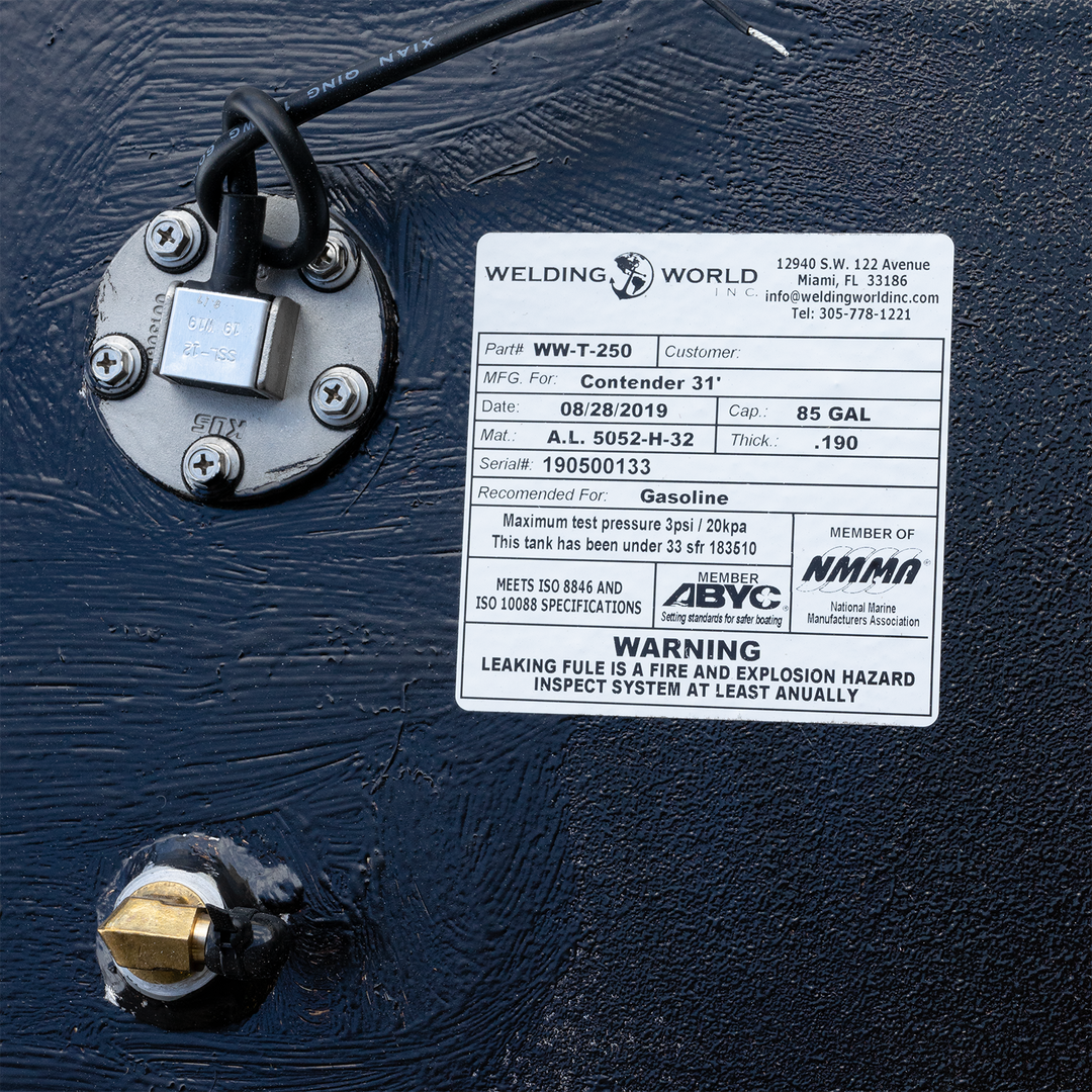 Label on a Contender 31' OEM Replacement fuel tank combo kit, featuring a large belly tank with a capacity of 128 gallons, two standard saddle tanks each with a capacity of 85 gallons, and a water tank with a capacity of 21.26 gallons. The label includes part number WM-T250, manufacturing date 08/28/2019, and specifications for gasoline use, along with a warning about fuel and explosion hazards