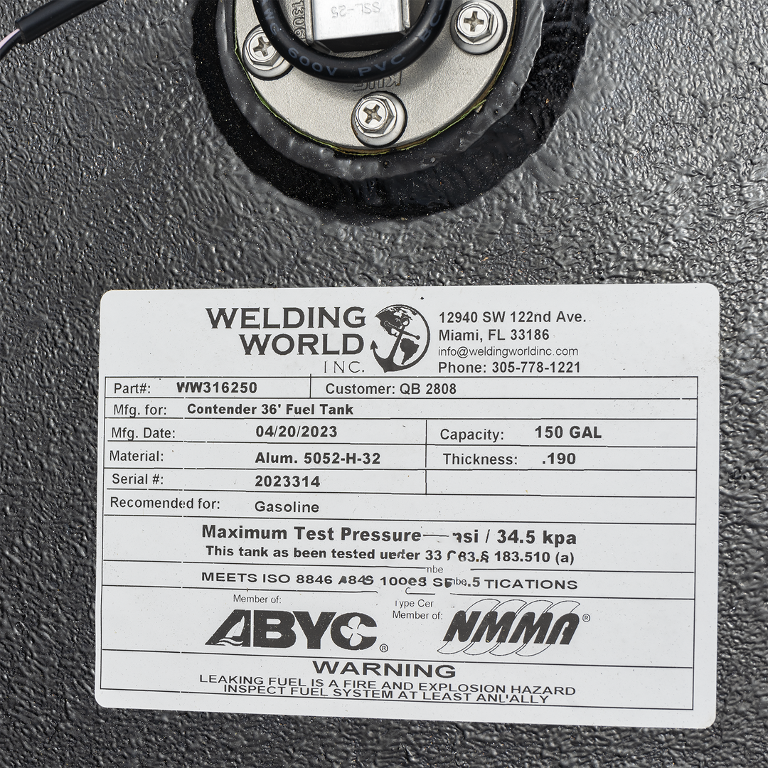 Close-up of a Welding World Inc. label on a black aluminum fuel tank. The label lists part number WW316250 for a Contender 36' fuel tank, manufactured on 04/20/2023. Capacity is 150 gallons, made of Aluminum 5052-H-32 with 0.190-inch thickness. Serial number 2023314. Recommended for gasoline. Certified by ABYC and NMMA, meeting ISO 8846 standards. Warning about fire and explosion hazard from leaking fuel. Contact info includes Miami, FL address and phone number 305-778-1221