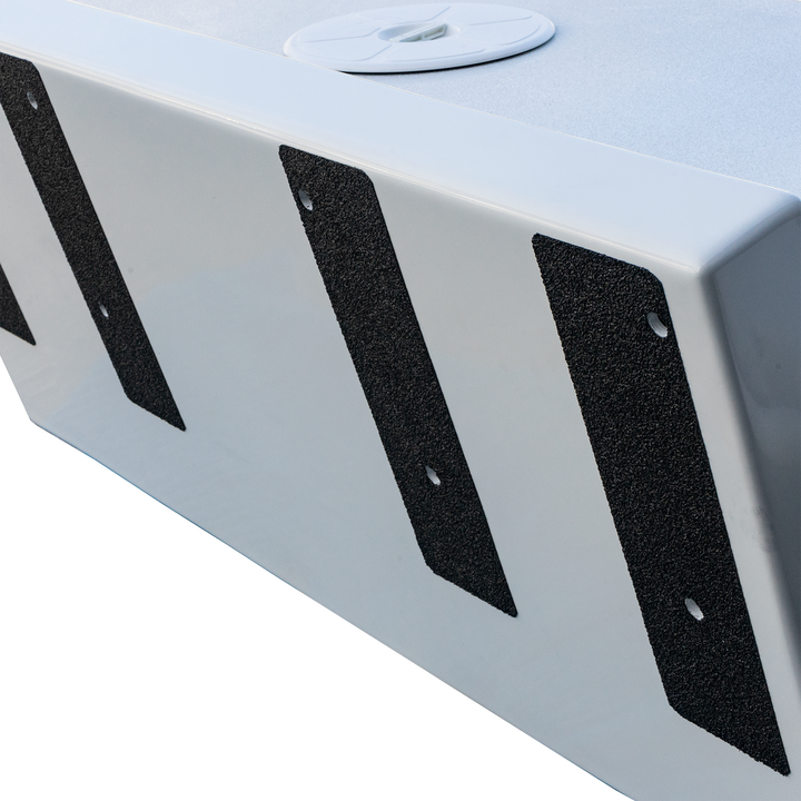 Close-up of a custom-built Apex Mk. II twin engine bracket featuring a white surface with black textured strips for enhanced grip and stability. The bracket has a circular mounting point on top, designed for secure engine attachment