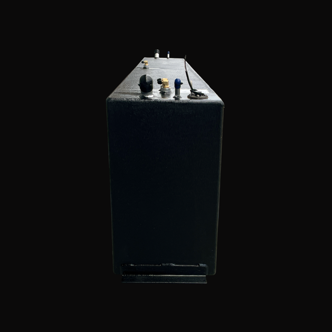 A close-up rear profile view of the Fiesta Vee Rinker 340 replacement marine fuel tank, emphasizing its tall, slim rectangular profile and a bottom-mounted mounting flange. The entire exterior is coated with a premium black TarGard epoxy finish for elite defense against corrosion in marine environments. This perspective provides a clear view of the top-deck hardware cluster, featuring a fuel fill port, a brass pickup elbow, vent fittings, and a fuel level sending unit. Precision-built by Welding World from 