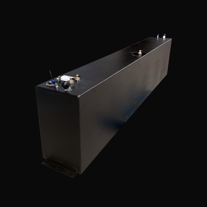 A perspective high-angle view of a Fiesta Vee Rinker 340 2004 OEM replacement marine fuel tank, showcasing its elongated rectangular design and protective black TarGard epoxy coating. This view highlights the top deck hardware configuration, including the integrated fuel sending unit, brass pickup elbows, fuel fill neck, and vent connections. Precision-engineered from heavy-duty .190" marine-grade aluminum by Welding World, it features a lower mounting flange and is built for a guaranteed 100% drop-in fit.
