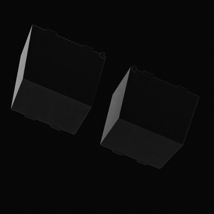A low-angle worm's-eye view looking up at the bottom profile of a pair of black Formula 45 Yacht Saddles diesel replacement marine fuel tanks. This unique perspective showcases the multi-angled, hull-conforming bottom contour and tapered side profile geometry of these twin 175-gallon saddle fuel cells, precision-engineered by Welding World to sit flush within the angled port and starboard bilge sections of the vessel's hull. Fabricated from heavy-gauge marine-grade 5052-H32 aluminum, the structures are comp
