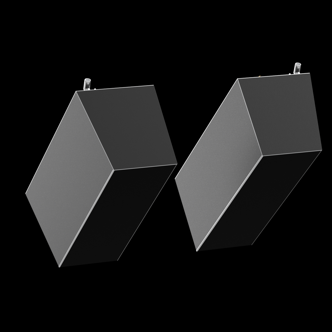 Two dark grey, rectangular fuel tanks are angled against a black background, appearing to lean inward towards each other. Each tank has a thin white outline along its edges and a small white cylindrical fitting protruding from its top surface