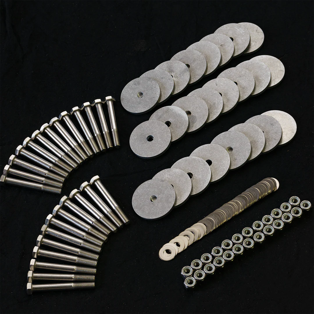 Stainless steel fastener kit for a boat transom/outboard engine bracket, specifically for the Glastron Sea Fury 216 Apex model. The kit contains 32 large through-bolts, 30 fender washers for load distribution, 32 nuts, and a collection of smaller washers, all necessary for a secure marine installation.