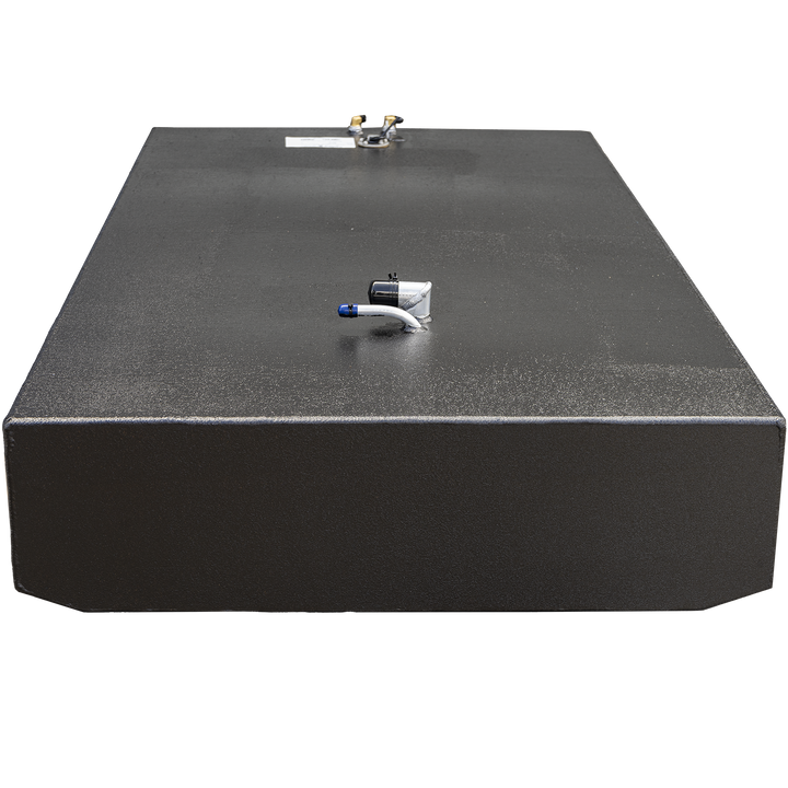 Front view of a black rectangular fuel tank with a textured surface. The tank has two fittings on the top, including a black and white valve with a blue cap, and an attached label with specifications. The tank is shown isolated on a transparent background