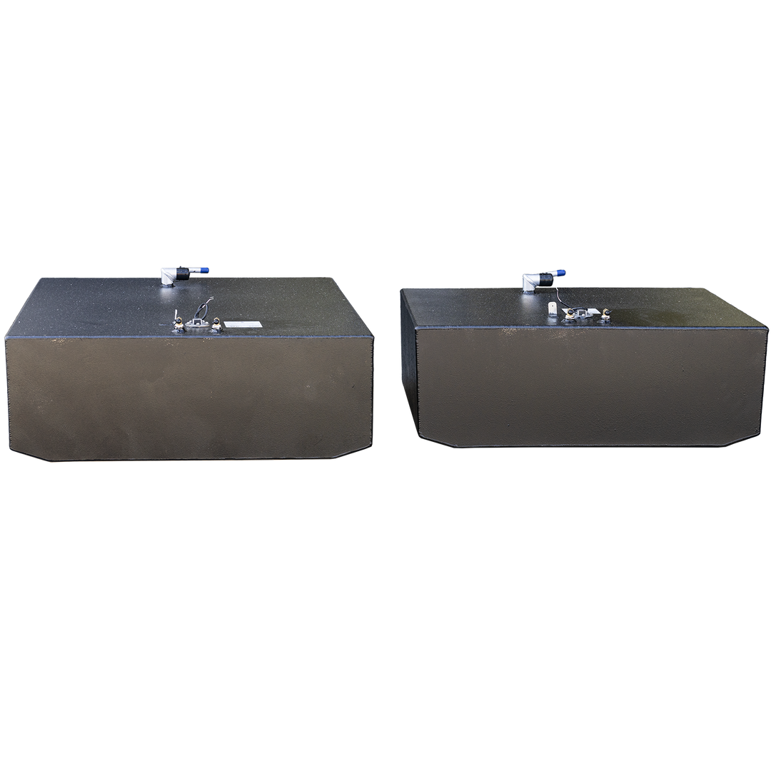 Side-by-side display of the OEM replacement fuel tanks for the 1989 Grady-White 25 Sailfish: 73-gallon forward tank (left) and 124-gallon aft tank (right). Both tanks feature a matte black finish with top-mounted blue-handled shutoff valves and brass return fittings. Affixed labels verify fabrication specs, including .190″ 5052-H32 aluminum construction and regulatory certifications. Clean, parallel layout emphasizes proportional dimensions and top-fitting symmetry for OEM integration