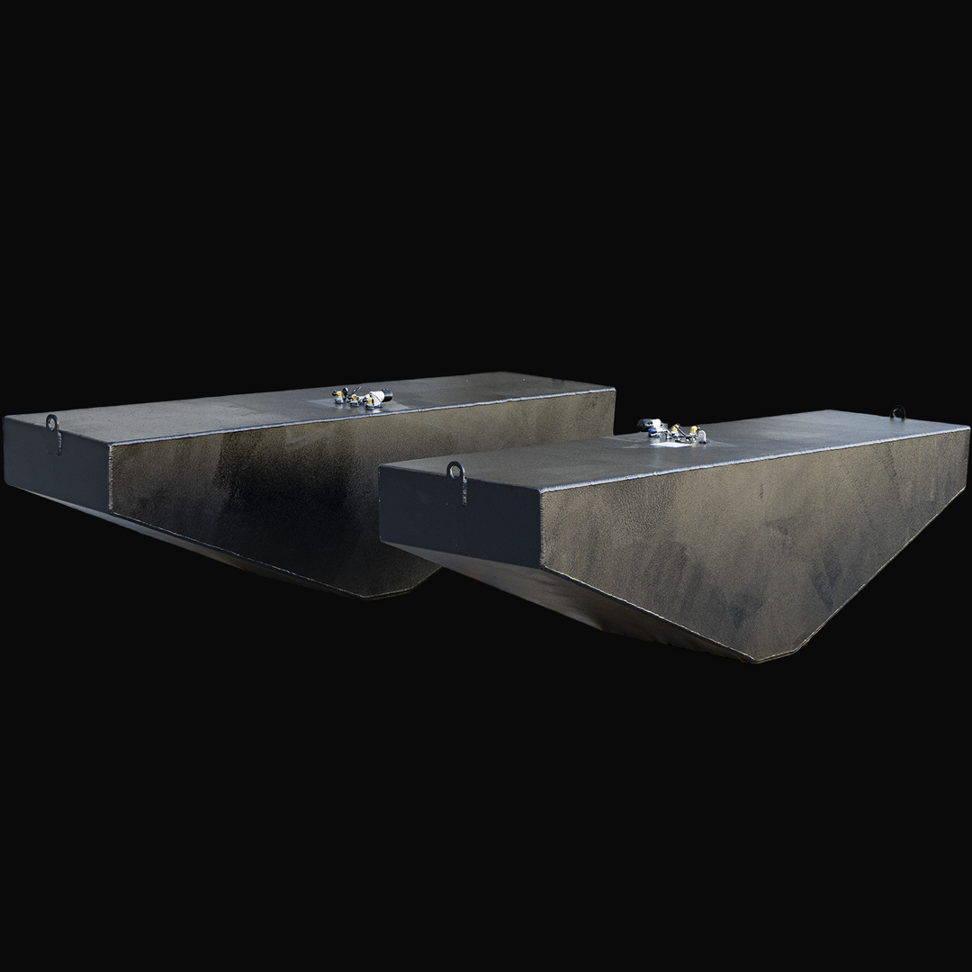 Front view of two light gray 3D-rendered OEM replacement fuel tanks for the 2007 Grady-White 360 Express, each with a 185-gallon capacity. Tanks include front lifting tabs and top-mounted fittings, with the right tank showing a sloped bottom edge for hull conformity