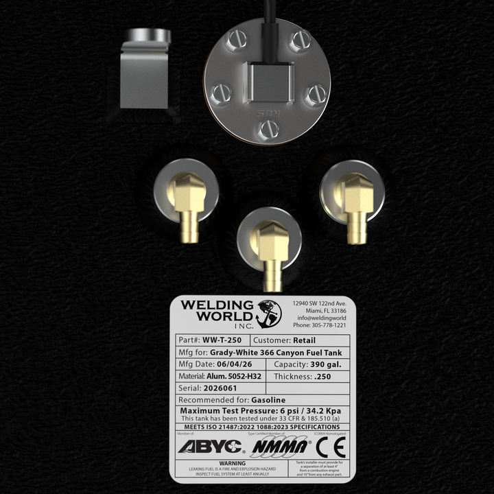 A detailed top-down view of the manufacturer specification plate and deck hardware on a Grady White 366 Canyon 390-gallon OEM replacement marine fuel tank. The official metal certification tag from Welding World Inc. specifies a 390-gallon capacity, heavy-duty .250 thickness marine-grade 5052-H32 aluminum construction, a maximum test pressure of 6 psi / 34.2 Kpa, and full compliance with ABYC, NMMA, and CE standards for gasoline fuel cells. Positioned next to the label is a five-bolt electronic fuel level s