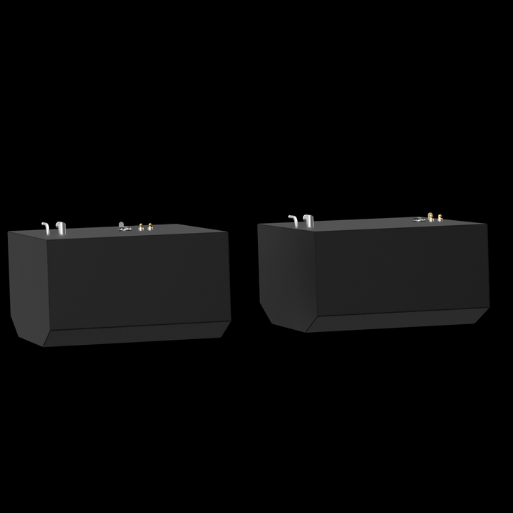 Two dark grey, rectangular fuel tanks are shown from an elevated perspective against a black background with subtle white dots. Both tanks feature golden and silver-colored fittings on their top surfaces, including pipes and valves. The tanks have angled bottom corners