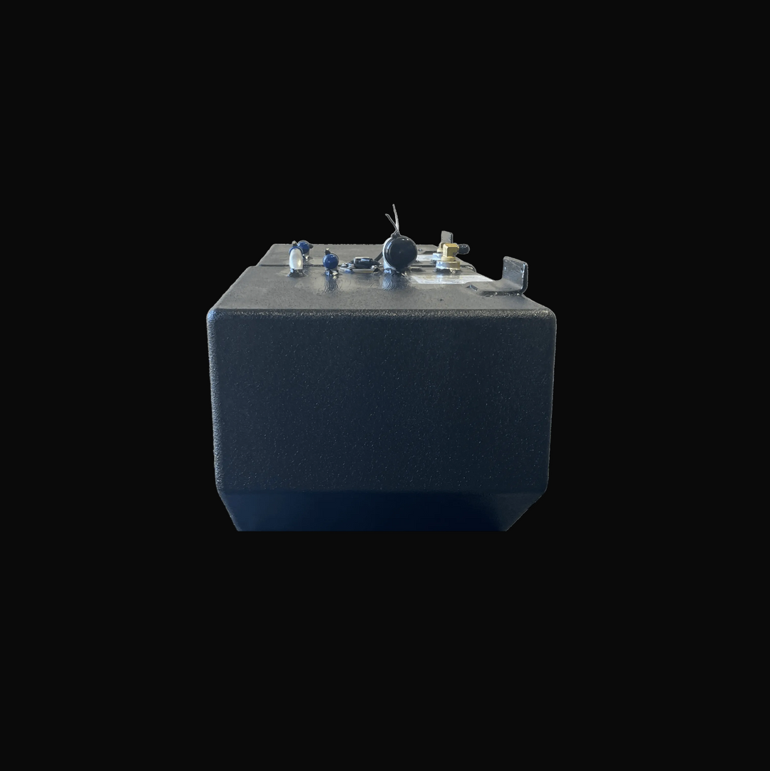 Perspective end view of the Hewes 18 Redfisher replacement fuel tank (26 gal). The image details the angled bottom contour for hull fitment, the textured black protective coating, and the complete top-mounted fitting assembly including the fill elbow and sender.