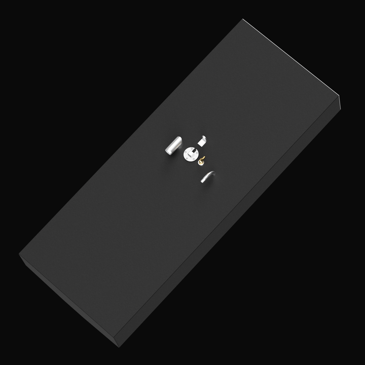 3D rendered image of a black rectangular marine fuel tank with beveled front corners, shown from an overhead diagonal angle on a black background. The tank’s top surface features five fittings including a white vent pipe, a round silver cap, a brass fitting, and two smaller white and silver fittings arranged near the center