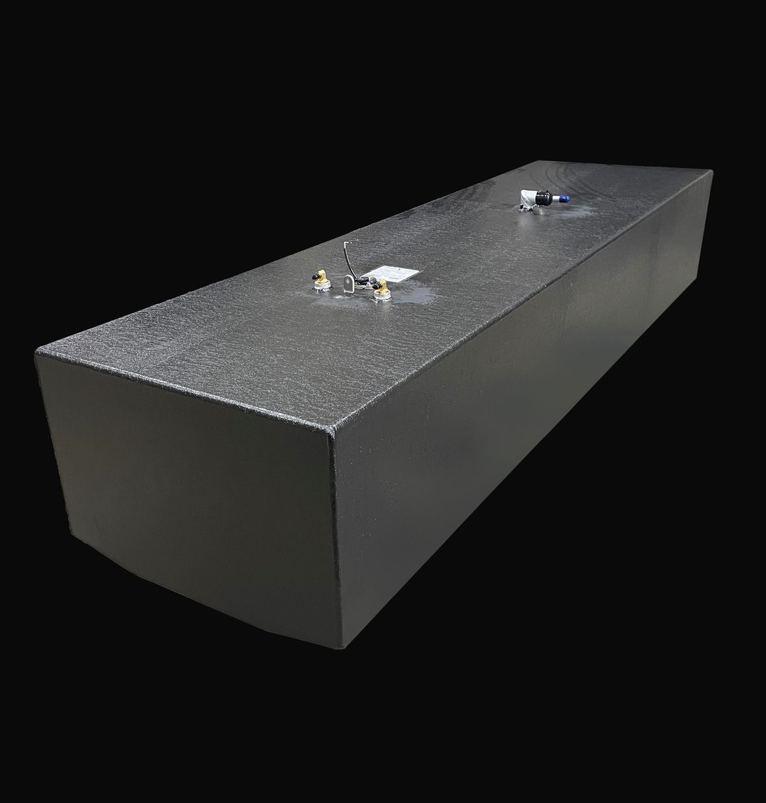 A 192-gallon Hydra Sport 25 (1994) belly fuel tank featuring a full Coal Tar Epoxy coating for maximum corrosion resistance. The image shows the long-profile design with precision-welded fuel pickups, sender unit, and 90-degree vent fittings, engineered for a guaranteed OEM fit in the center stringer cavity.