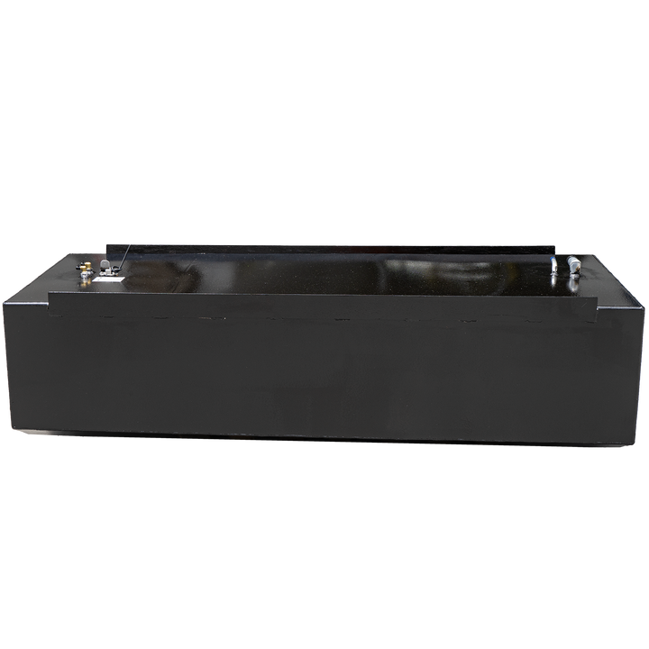 A black, rectangular fuel tank with a slightly textured surface and a dark, reflective strip along its top edge, is shown against a black and grey checkered background. Various metallic and plastic fittings are visible on the top surface