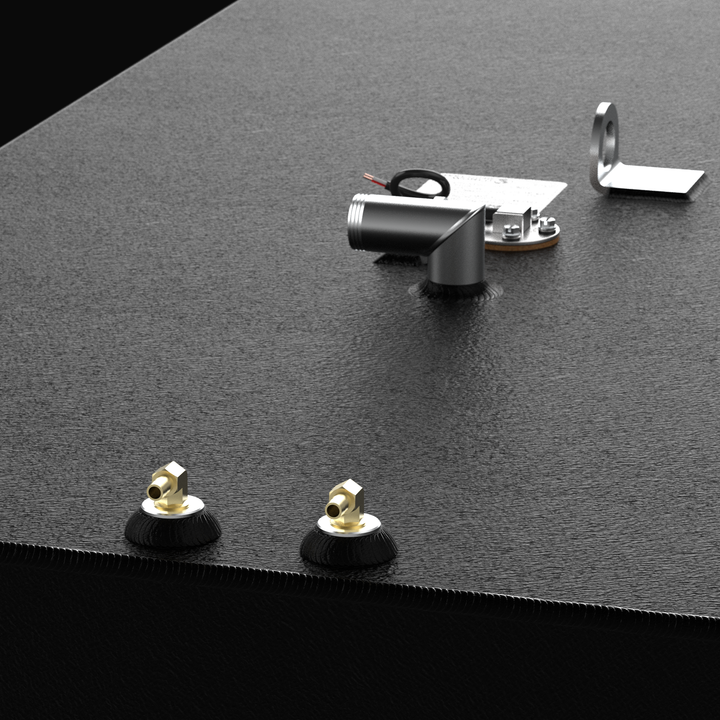 A close-up, high-angle perspective rendering focusing on the top deck plumbing hardware configuration of a black encapsulated Intrepid 30 CC Open OEM replacement marine fuel tank from file image_437965.jpg, isolated against a black background. This detailed view highlights the textured, anti-corrosive black TarGard epoxy coating that encapsulates the heavy-gauge marine-grade 5052-H32 aluminum tank body to eliminate the threat of saltwater pitting and crevice corrosion inside the bilge cavity. Positioned in 