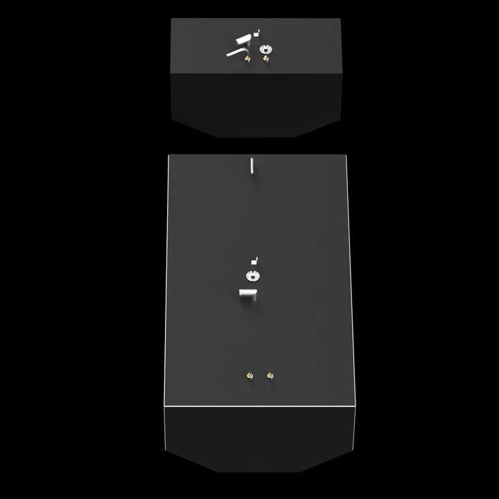Two dark grey fuel tanks, one smaller and rectangular at the top, and one larger and elongated at the bottom, are arranged vertically against a black background. Both tanks feature various silver and brass-colored fittings on their top surfaces, and the larger tank has a white outline along its top edges