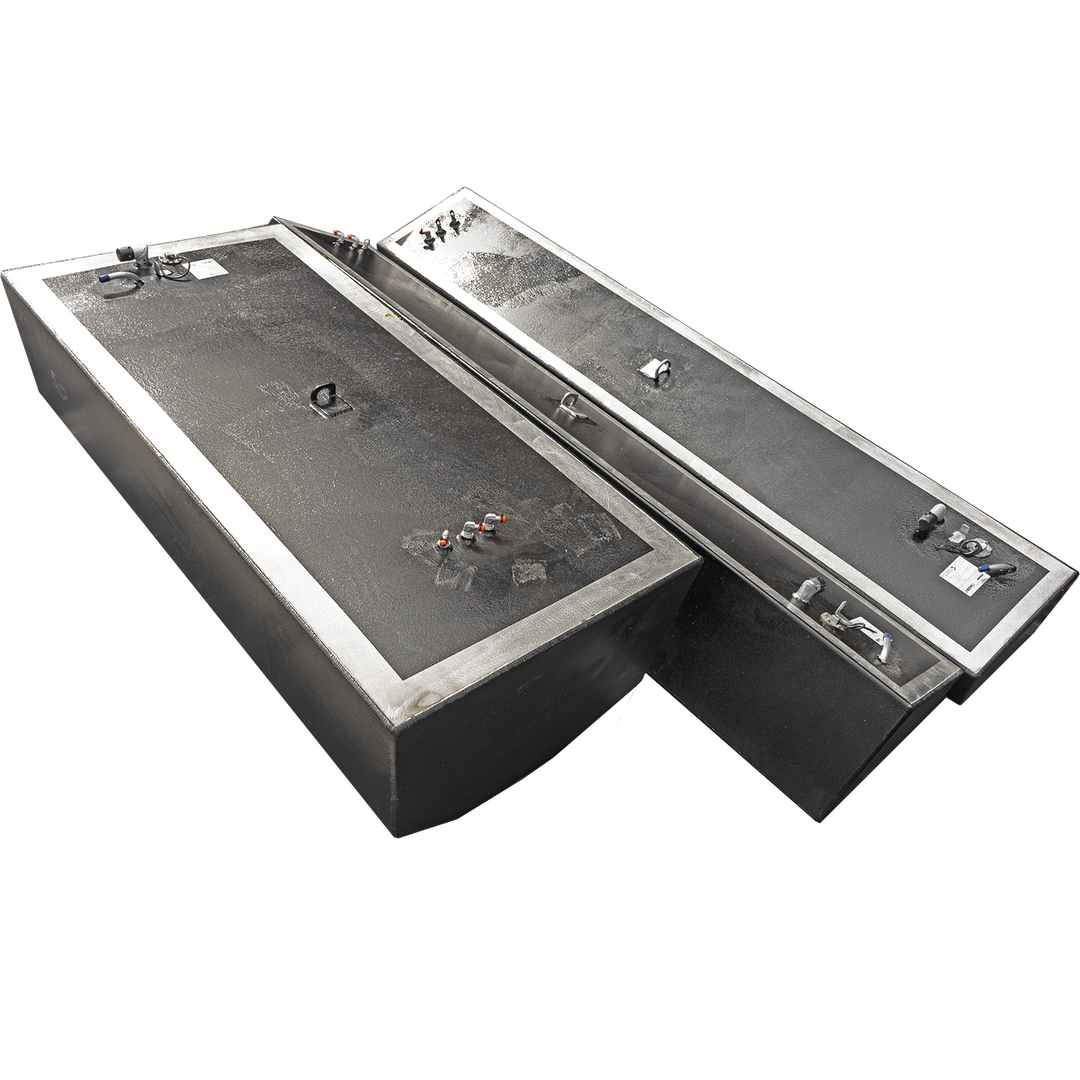 Three boat fuel tanks, one large and two smaller, are presented on a checkerboard background. The tanks are black with silver trim, and their top surfaces feature various fittings and connections. The large tank is in the foreground, angled towards the viewer, while the two smaller, elongated tanks are positioned behind it, also at an angle. The image suggests a combination of fuel tanks for a boat